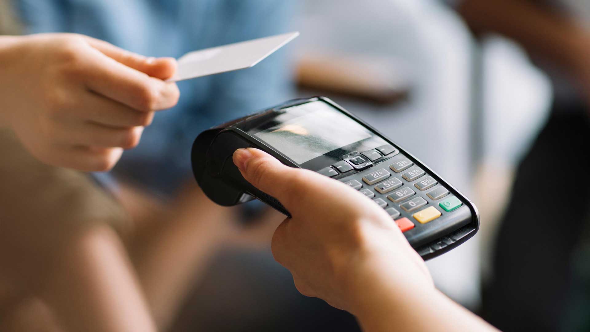 wcredit card being tapped for payment | payments 